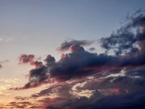 Evening sky. Clouds in the evening sky. Sky at sunset with clouds Stock Photos