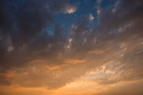Evening sky with colorful rain clouds Stock Photos