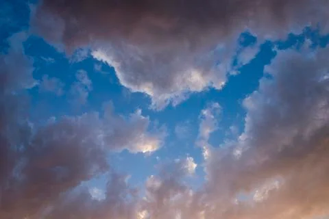 Evening sky with colorful rain clouds Stock Photos