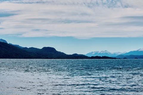 Evening sky with dramatic clouds over mountains Stock Photos