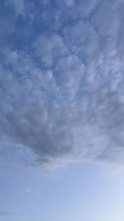 Evening sky with fluffy clouds, vertical video Stock Footage 276500909
