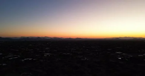 Evening Sky Over a Quiet Desert Residential Area Stock Photos