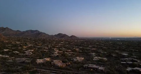Evening Sky Over a Quiet Desert Residential Area Stock Photos