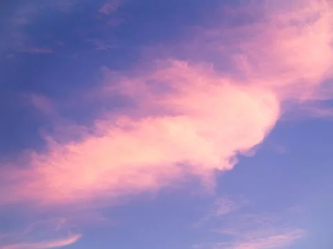 Evening sky with pink clouds Stock Photos