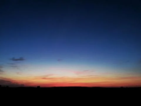 Evening sky. The sun has set and it's on fire for the horizon Photos