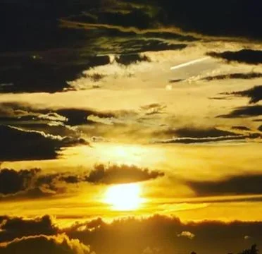 Evening sky sun Stock Photos