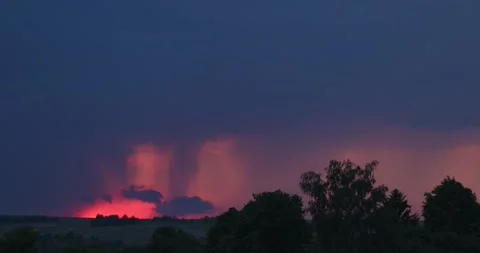 Evening sky thunderstorm lightning over village an impending storm evening Stock Footage 132953006