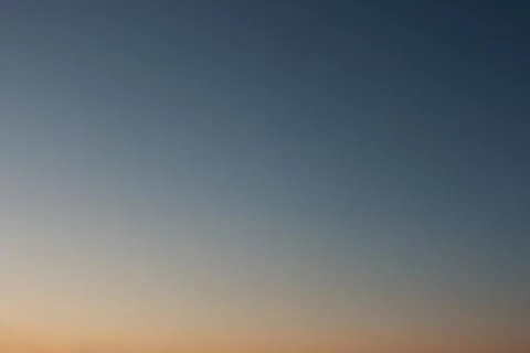 Evening sky without clouds. Clear sky as background or gradient. Stock Photos