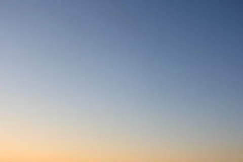 Evening sky without clouds. Clear sky as background or gradient. Stock Photos