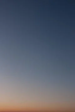 Evening sky without clouds. Clear sky as background or gradient. Stock Photos