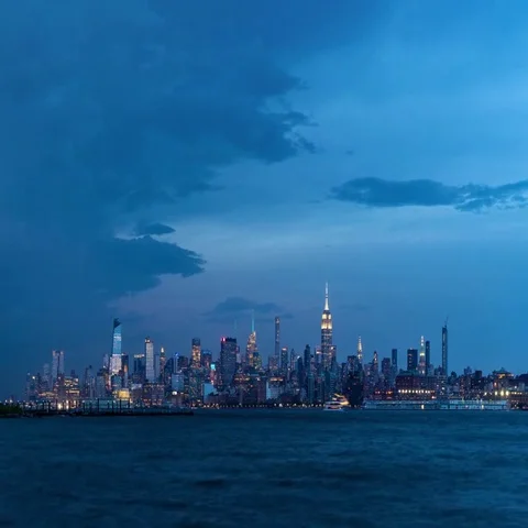 Evening storm and lightning over New York City Midtown skyscrapers Stock Footage 69629207