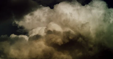 Evening storm clouds burst with texture and thunderheads strengthen. Stock Footage 235644823