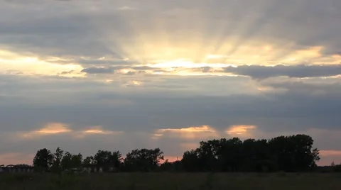 Evening storm sky with sun beams in a summer field Stock Footage 52922035