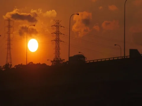 Evening sun and clouds with traffic bridge Stock Footage 73810636