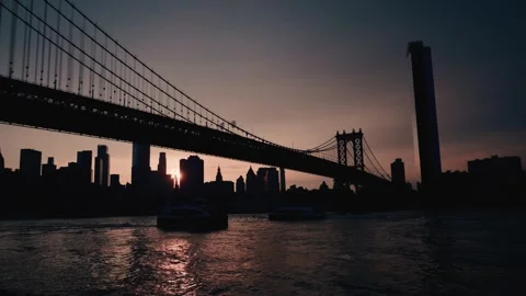 Evening Sun Behind Manhattan Bridge Stock Footage 321011103