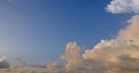 The evening sun dyed the clouds into gold 스톡 동영상 113527567