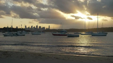Evening sun hitting waves at Watsons Bay Sydney slow motion 4K Stock Footage 150713573
