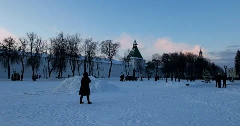 In the evening the sun sets behind the white stone walls of the monastery Stock Footage 67568639