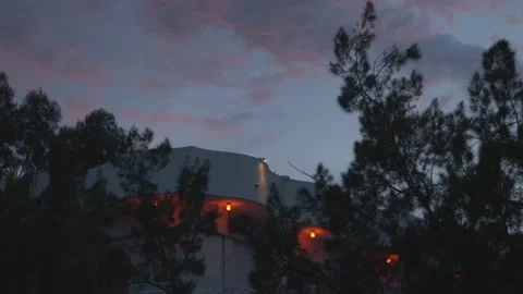 Evening Sun Setting Over Compound-like Building Stock Footage 132018455