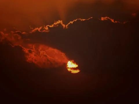 The evening sun in the sky and clouds Foto stock