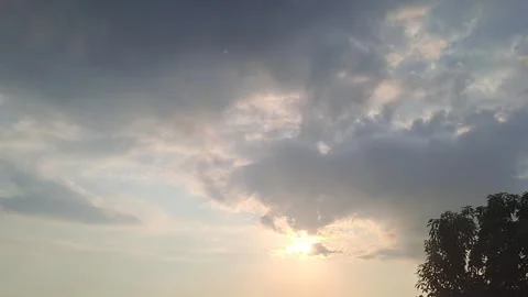 Evening Sun Timelapse with Clouds Rolling in Stock Footage 292949233