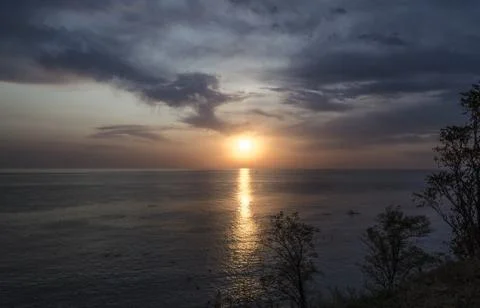 Evening sunset and clouds Stock Photos