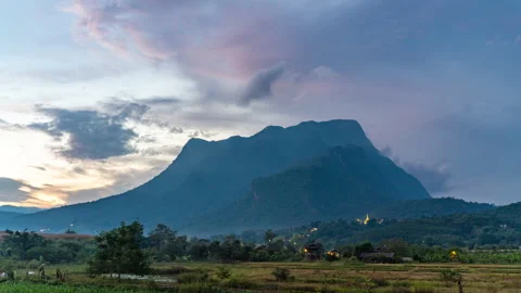 Evening sunset and moving clouds from the top of Doi Luang Chiang Dao Stock Footage 258456280