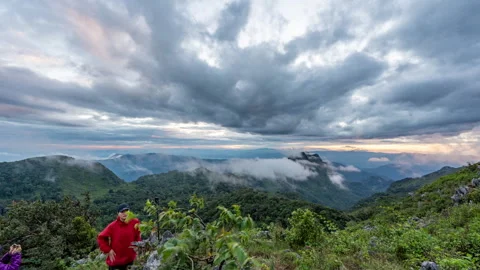 Evening sunset and moving clouds from the top of Doi Luang Chiang Dao Stock Footage 258456720