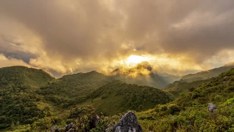 Evening sunset and moving clouds from the top of Doi Luang Chiang Dao Stock Footage 258456722