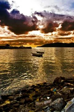 Evening sunset in the bay Stock Photos
