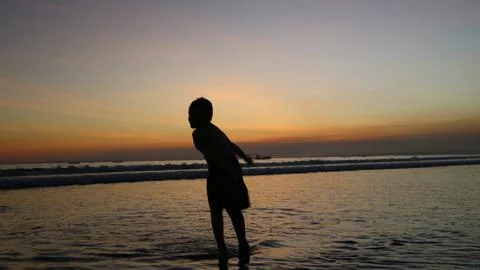 Evening sunset on the beach Stock Photos