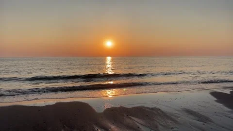 Evening sunset on a beautiful sandy beach. Stock Footage 316117497