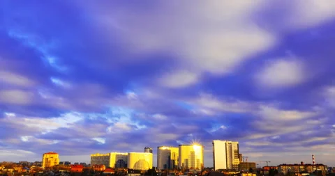 Evening sunset with clouds over the city area with multi-storey buildings Stock Footage 187544836