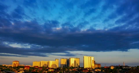 Evening sunset with clouds over the city area with multi-storey buildings Stock Footage 198546819