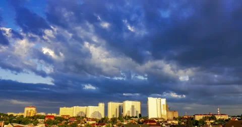 Evening sunset with clouds over city area with high-rise buildings Stock Footage 198548648
