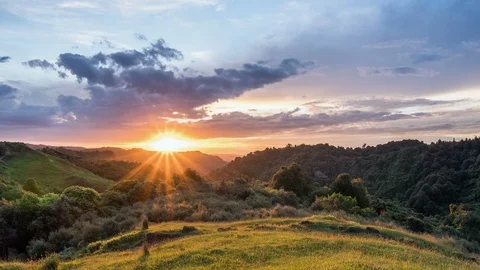 Evening sunset with dramatic cluds sky in wild nature of New Zealand Time lapse Stock Footage 106006720