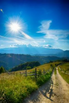 Evening, sunset on mountain hills of Simon village. Bran. Stock Photos