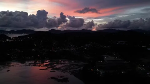 Evening sunset overlooking the mountains and the sea bay. Drone video Stock Footage 297544517