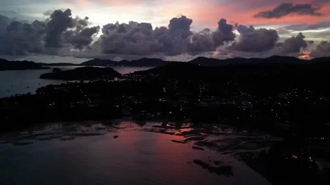 Evening sunset overlooking the mountains and the sea bay. Drone video. Part 1 Video stock 297544538
