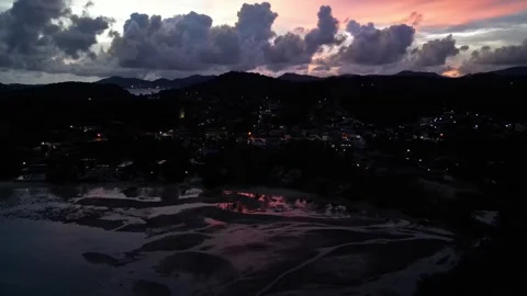 Evening sunset overlooking the mountains and the sea bay. Drone video Video stock 297544542