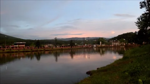 An evening sunset with reflections by the lake 動画素材 158362262