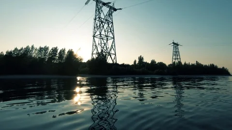 Evening sunset on the river and clean technology man-1 Stock Footage 113124811