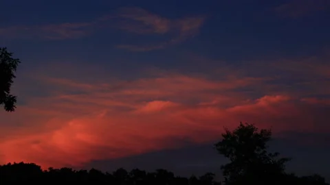 Evening Sunset Is Slowly Setting Behind The Trees 動画素材 145828171