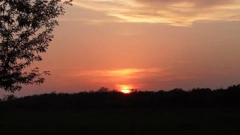 Evening sunset is a stunning natural phenomenon, as every sunset is unique Stock Footage 163045575