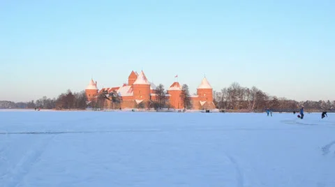 Evening sunset Trakai castle snow people tourists leisure Stock Footage 22536265