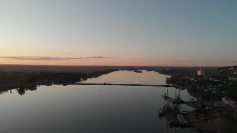 Evening sunset view of the river and the bridge from a height of 300 meters Stock Footage 131114776