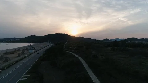 Evening sunset on the view of the sea and mountains 库存影片 103812346