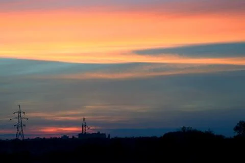 Evening sunset with vivid clouds Stock Photos