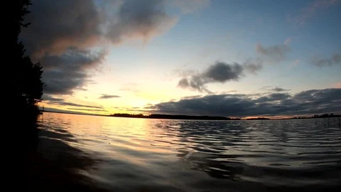 Evening sunset by the water timelapse. Sunset on nature travel. Stock Footage 118267411