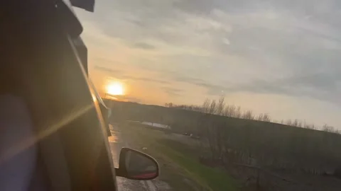 Evening sunset. We drive along the highway. Stock Footage 237937991